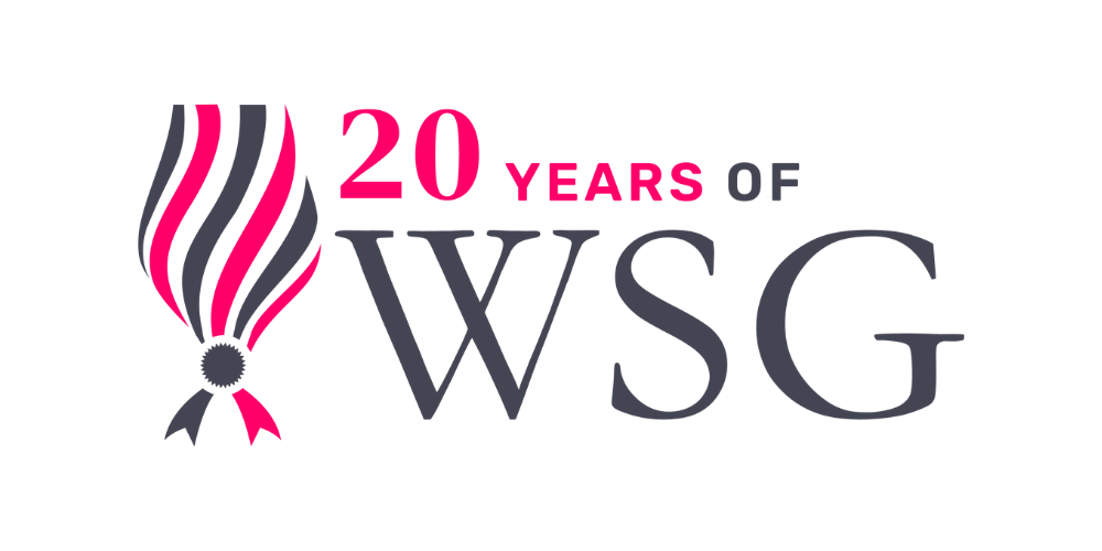 Wine Scholar Guild wine tour group walking through scenic vineyards, learning about terroir and regional viticulture